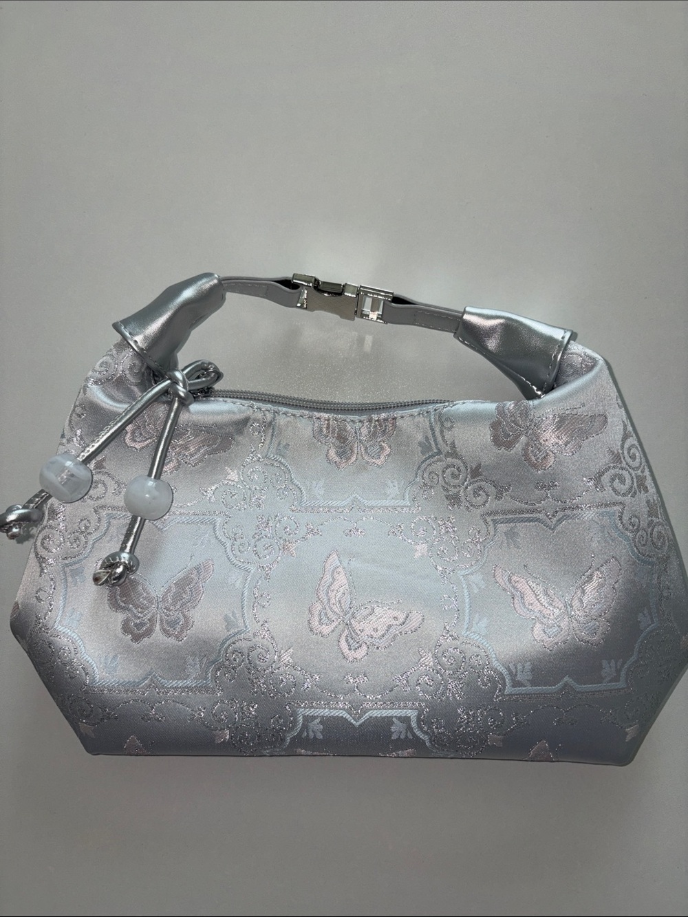 Elegant Silver-Gray Jacquard Handbag with Butterfly Motif